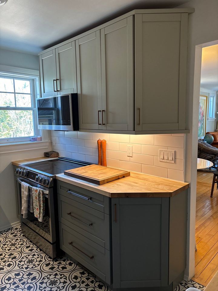 Kitchen cabinets refinished by Maple City Painters